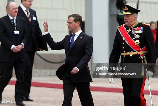 Russian President Dmitry Medvedev and King Harald V of Norway attends the official welcome ceremony for the Medevedevs outside the Royal Castle on...