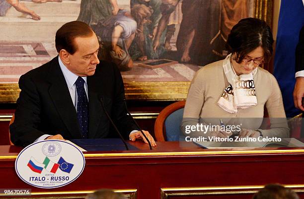 Italian Prime Minister Silvio Berlusconi and Italian Education Minister Maria Stella Gelmini attends a press conference held at Villa Gernetto on...