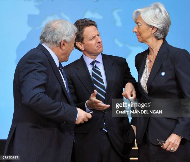 International Monetary Fund Managing Director Dominique Strauss-Kahn chats with US Treasury Secretary Tim Geithner and France's Finance Minister...