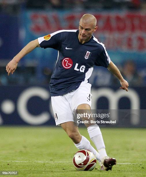 Paul Konchesky of Fulham runs with the ball during the UEFA Europa League semi final first leg match between Hamburger SV and Fulham at HSH Nordbank...