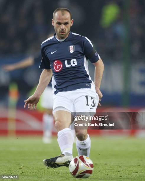 Danny Murphy of Fulham runs with the ball during the UEFA Europa League semi final first leg match between Hamburger SV and Fulham at HSH Nordbank...