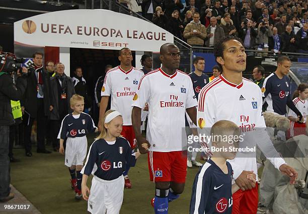 Jerome Boateng, Guy Demel and Paolo Guerrero of Hamburg enters the pitch prior to the UEFA Europa League semi final first leg match between Hamburger...