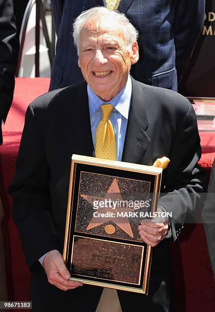 Actor/Director Mel Brooks shows a copy of his star at the ceremony to unveil his Hollywood Walk of Fame star in Hollywood on April 23, 2010. Mel...