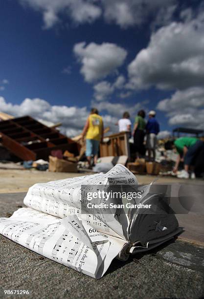 Pages of a hymnal flap in the wind in front of what was the Hillcrest Baptist Church April 25, 2010 in Yazoo City, Mississippi. On Saturday a massive...