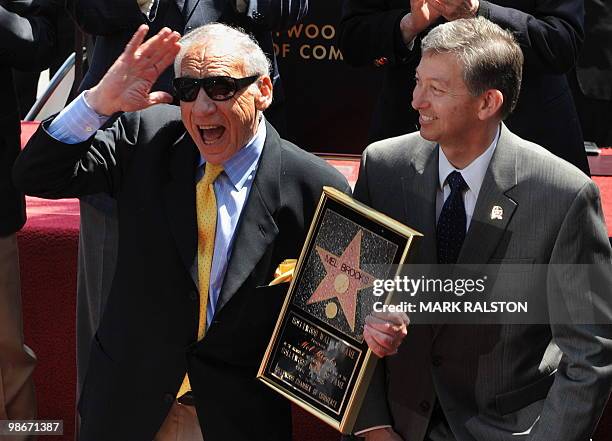 Actor/Director Mel Brooks poses for photographers with his son Max and grandson Henry at the ceremony to unveil his Hollywood Walk of Fame star in...