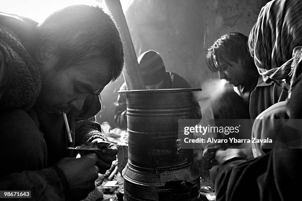 Drug addicts in the former Russian Cultural Centre in Kabul, where up to 1700 addicts come and go from this Soviet-style building, injecting and...