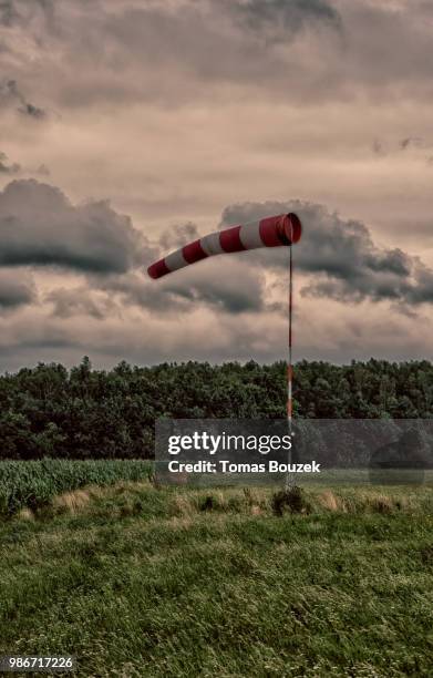wind indicator - windsock stock pictures, royalty-free photos & images