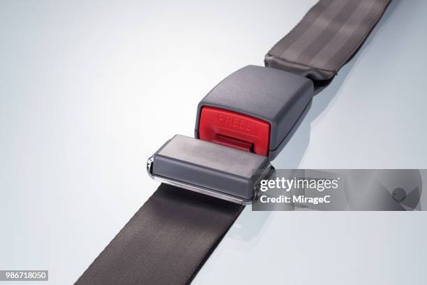 seat belt fastening - buckle fotografías e imágenes de stock