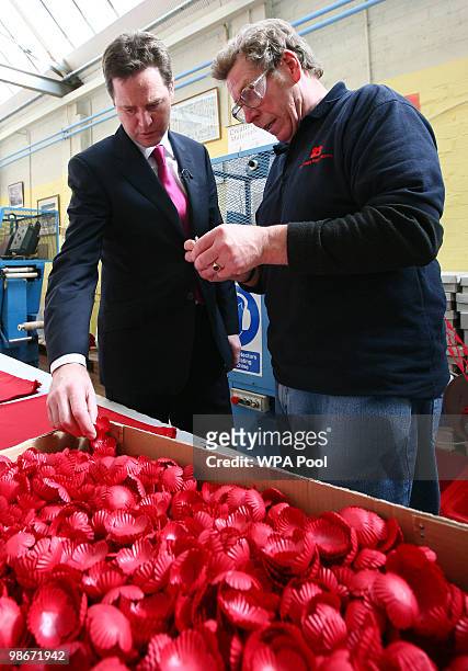 Liberal Democrat leader Nick Clegg speaks to Arthur Dyke during an election campaign visit to the Lady Haig Poppy Factory on April 26, 2010 in...