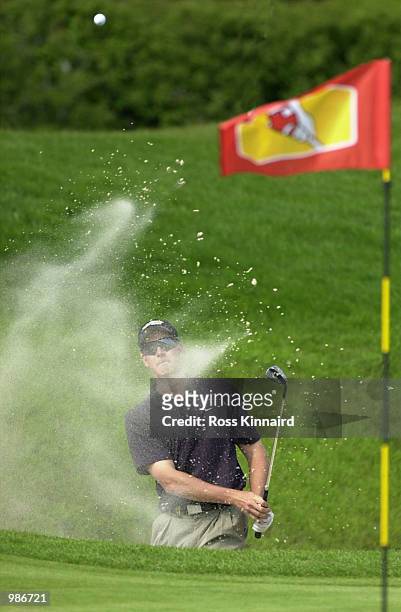 Henrik Stenson of Sweden plays fron a greenside bunker during his second round of the Benson & Hedges International open held at the Belfry,...