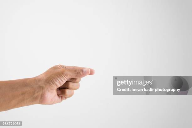 body part finger - hand holding fotografías e imágenes de stock