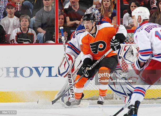 Claude Giroux of the Philadelphia Flyers sets up in front of Henrik Lundqvist of the New York Rangers for a scoring attempt on April 11, 2010 at the...