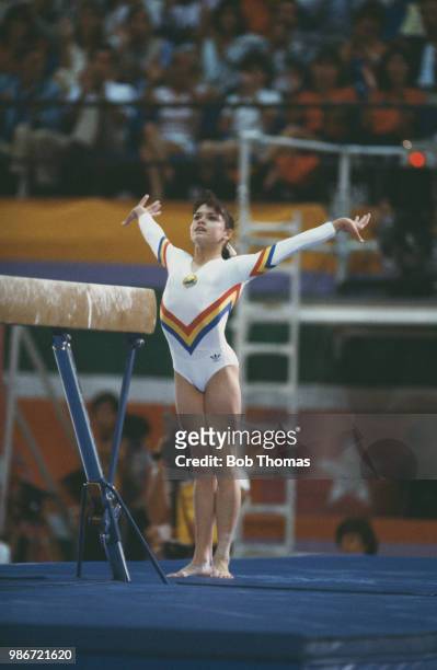 Simona Pauca of Romania competes in the women's balance beam competition of the artistic gymnastics events at the 1984 Summer Olympics in Los Angeles...