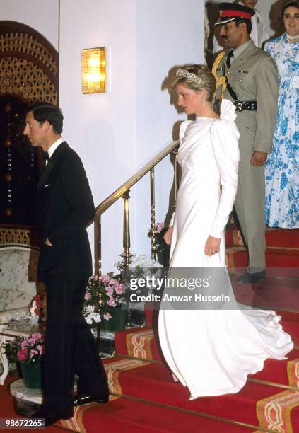 Prince Charles, Prince of Wales and Diana, Princess of Wales, wearing a white dress designed by David and Elizabeth Emanuel with the Spencer Tiara,...