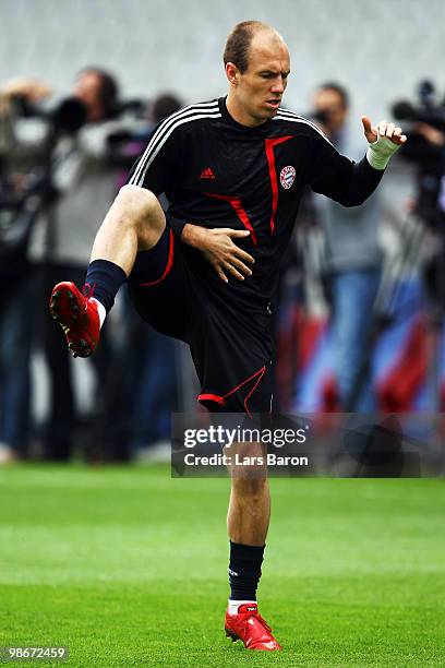 Arjen Robben warms up during a Bayern Muenchen training session at Stade de Gerland on April 26, 2010 in Lyon, France. Muenchen will play against...