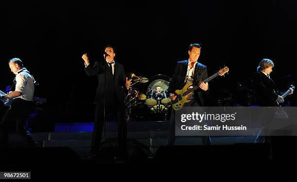 Gary Kemp,Tony Hadley, Martin Kemp and Steve Norman of Spandau Ballet perform as part of their comeback tour at the O2 Arena on October 20, 2009 in...