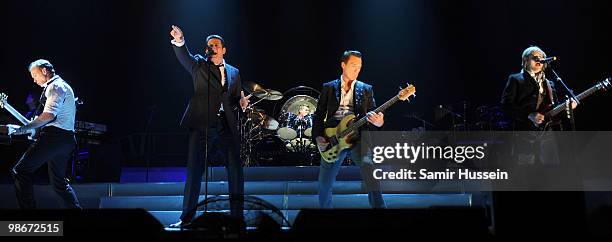 Gary Kemp,Tony Hadley, Martin Kemp and Steve Norman of Spandau Ballet perform as part of their comeback tour at the O2 Arena on October 20, 2009 in...