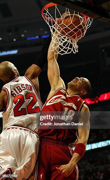 Anthony Parker of the Cleveland Cavaliers dunks the ball against Taj Gibson of the Chicago Bulls in Game Four of the Eastern Conference Quarterfinals...