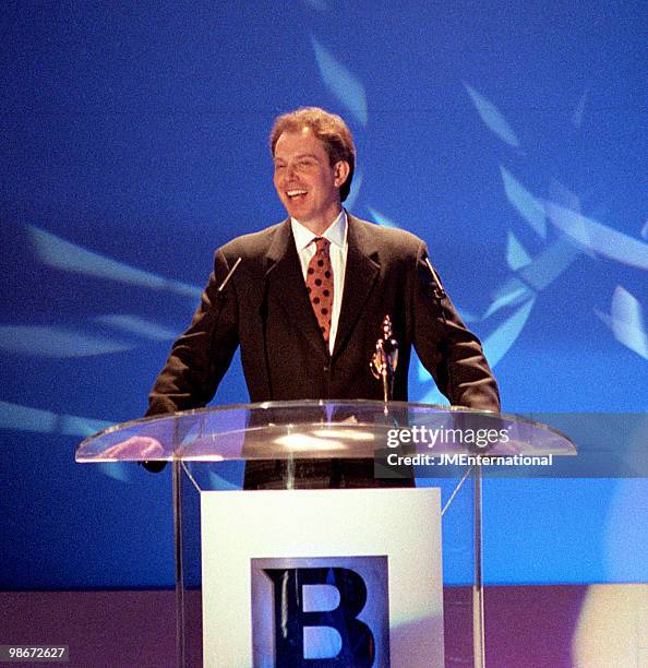 Labour Leader of the Opposition Tony Blair presenting an outstanding contribution award to David Bowie at the Brit Awards at Earls Court on February...