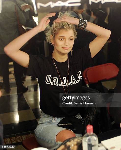 Model Pixie Geldof prepares backstage during the Vivienne Westwood Red Label fashion show during London Fashion Week on February 21, 2010 in London,...