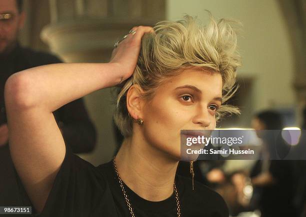 Model Pixie Geldof prepares backstage during the Vivienne Westwood Red Label fashion show during London Fashion Week on February 21, 2010 in London,...