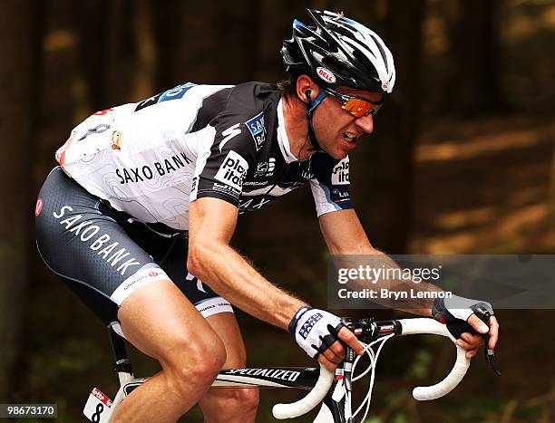 Jens Voigt of Germany and Team Saxobank breaks away from the peloton during the 96th Liège-Bastogne-Liège race on April 25, 2010 in Liege, Belgium.