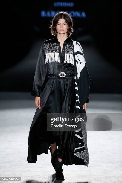 Model walks the runway at the Escorpion show during the Barcelona 080 Fashion Week on June 27, 2018 in Barcelona, Spain.