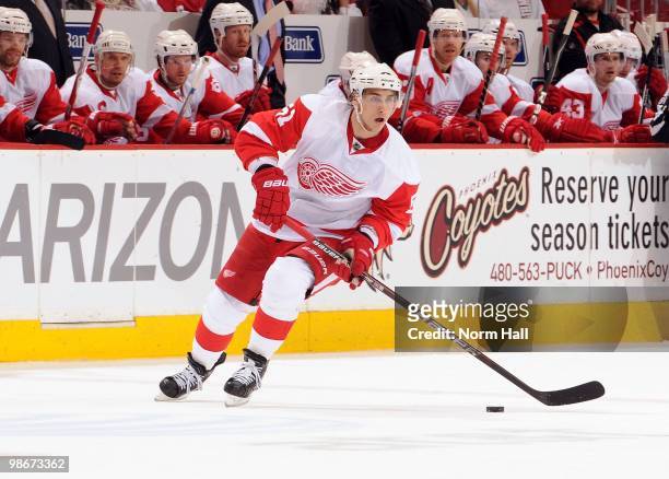 Valtteri Filppula of the Detroit Red Wings looks to pass the puck across ice against the Phoenix Coyotes in Game Five of the Western Conference...
