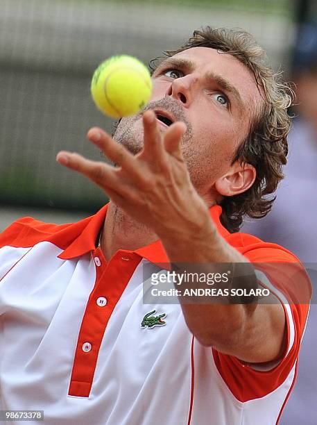 French Julien Benneteau serves the ball to US Sam Querrey during their ATP Tennis Open match in Rome on on April 26, 2010 in Rome. AFP PHOTO /...
