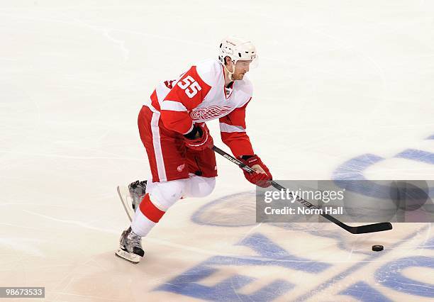 Niklas Kronwall of the Detroit Red Wings skates the puck up ice against the Phoenix Coyotes in Game Five of the Western Conference Quarterfinals...