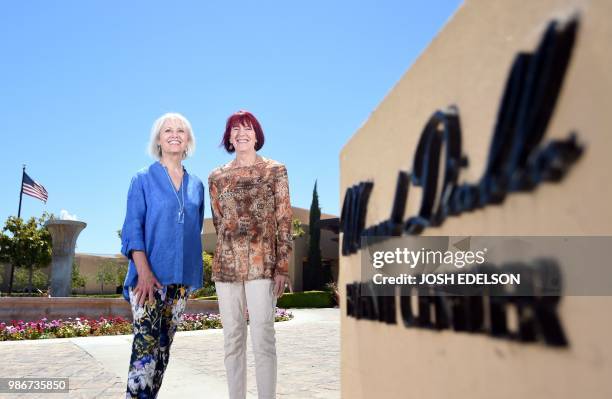 Kyle Johnson and MaryLou Molinaro, co-chairs of the Cannabis Discussion Club, pose for a photo at Trilogy at the Vineyards in Brentwood, some 55...