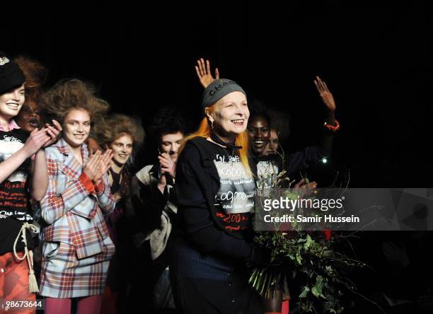 Designer Vivienne Westwood walks the catwalk with models during the Vivienne Westwood Red Label fashion show during London Fashion Week on February...