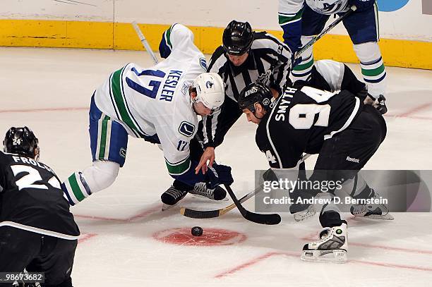 Ryan Smyth of the Los Angeles Kings takes the faceoff against Ryan Kesler of the Vancouver Canucks in Game Four of the Western Conference...