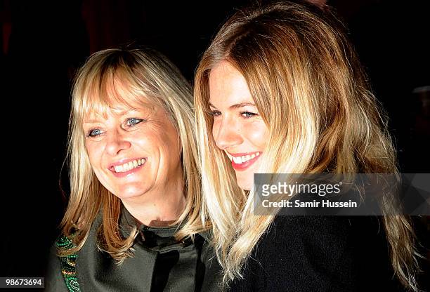 Sienna Miller and model Twiggy Lawson attend the Matthew Williamson fashion show during London Fashion Week on February 21, 2010 in London, England.