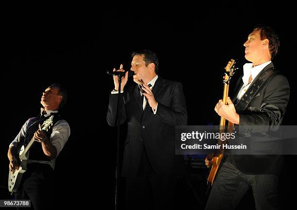 Gary Kemp,Tony Hadley, Martin Kemp of Spandau Ballet perform as part of their comeback tour at the O2 Arena on October 20, 2009 in London, England.