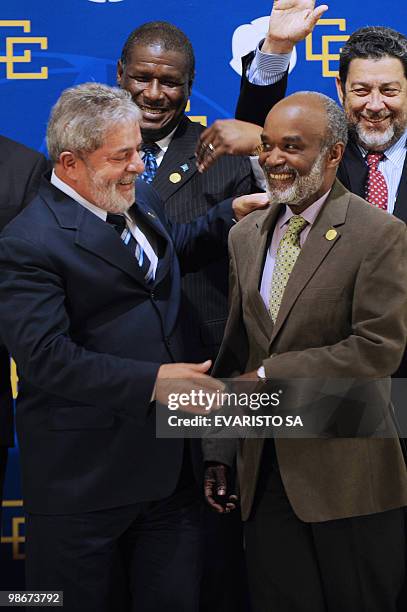 Brazil's President Luiz Inacio Lula da Silva and Haiti's President Rene Preval pose for the of the I Brazil-Caribbean Community Heads of State and...