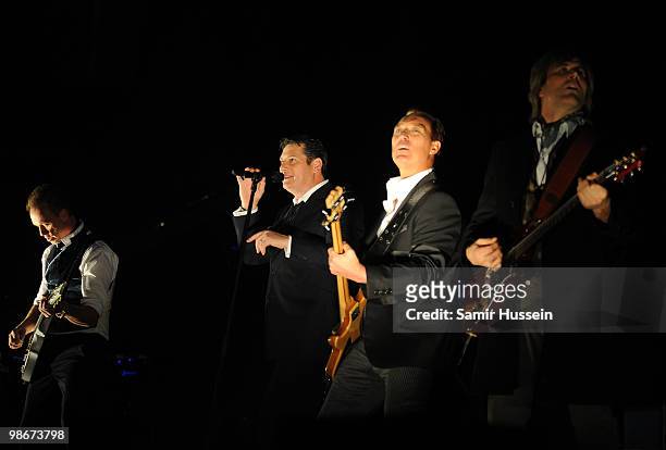 Gary Kemp,Tony Hadley, Martin Kemp and Steve Norman of Spandau Ballet perform as part of their comeback tour at the O2 Arena on October 20, 2009 in...
