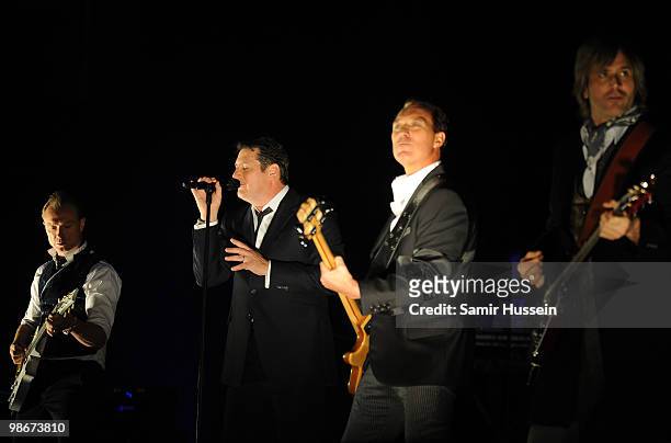 Gary Kemp,Tony Hadley, Martin Kemp and Steve Norman of Spandau Ballet perform as part of their comeback tour at the O2 Arena on October 20, 2009 in...