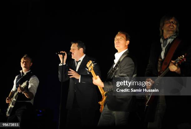 Gary Kemp,Tony Hadley, Martin Kemp and Steve Norman of Spandau Ballet perform as part of their comeback tour at the O2 Arena on October 20, 2009 in...