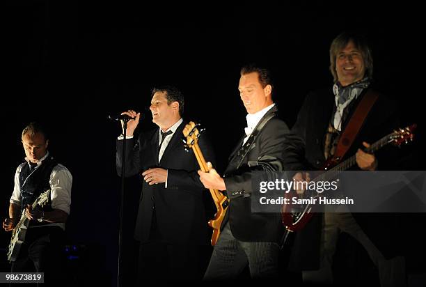 Gary Kemp,Tony Hadley, Martin Kemp and Steve Norman of Spandau Ballet perform as part of their comeback tour at the O2 Arena on October 20, 2009 in...