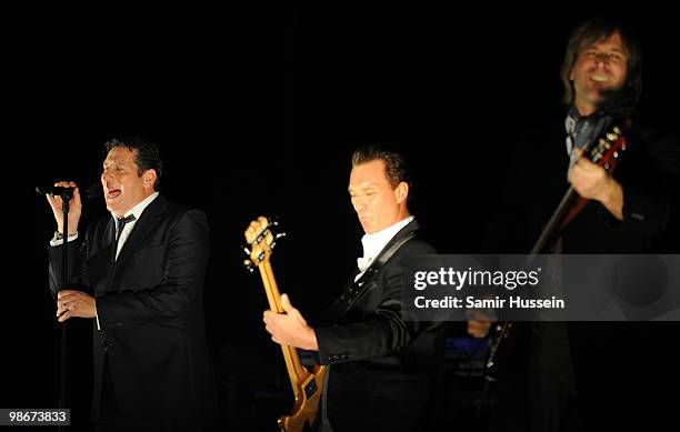 Tony Hadley, Martin Kemp and Steve Norman of Spandau Ballet perform as part of their comeback tour at the O2 Arena on October 20, 2009 in London,...