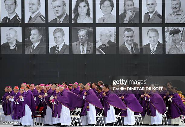 Polish clergy attend a mass during a public memorial service on Pilsudski square in Warsaw on April 17, 2010 for the 96 victims of last April 10's...