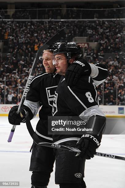 Jack Johnson and Drew Doughty of the Los Angeles Kings celebrate after a goal against the Vancouver Canucks in Game Four of the Western Conference...