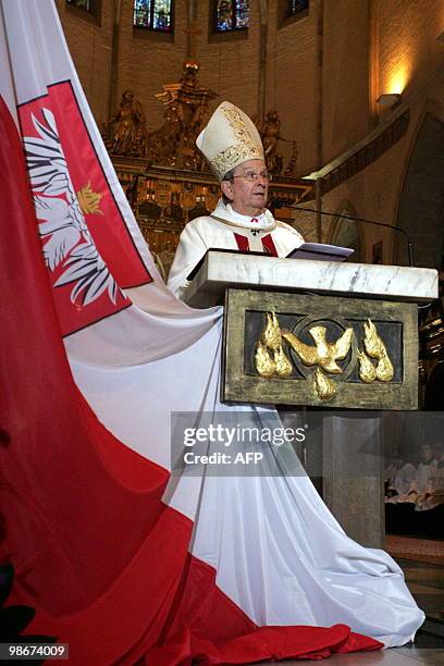 Head of Polish church archbishop Henryk Muszynski conducts a mass on April 11, 2010 in Gniezno, central Poland, the day after a plane carrying Polish...