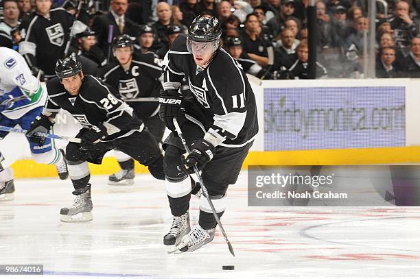 Anze Kopitar of the Los Angeles Kings skates with the puck against the Vancouver Canucks in Game Four of the Western Conference Quarterfinals during...