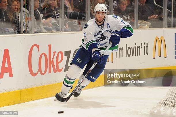 Ryan Kesler of the Vancouver Canucks skates with the puck against the Los Angeles Kings in Game Four of the Western Conference Quarterfinals during...