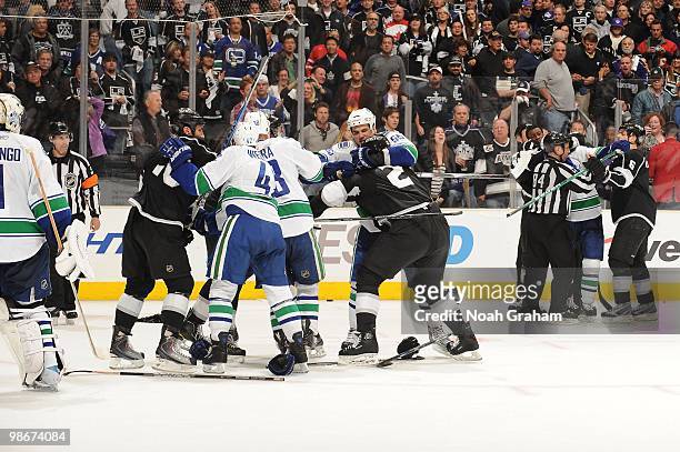 The Los Angeles Kings and the Vancouver Canucks fight at the end of Game Four of the Western Conference Quarterfinals during the 2010 NHL Stanley Cup...