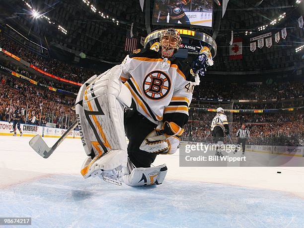 Tuukka Rask the Boston Bruins looks back into the net after allowing a goal against the Buffalo Sabres in Game Five of the Eastern Conference...