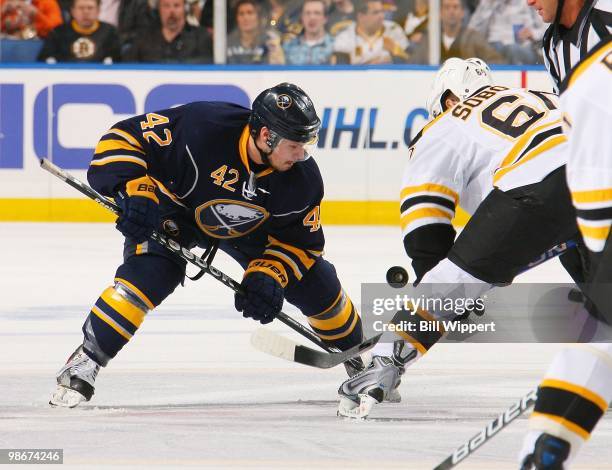 Nathan Gerbe of the Buffalo Sabres takes a faceoff against Vladimir Sobotka of the Boston Bruins in Game Five of the Eastern Conference Quarterfinals...