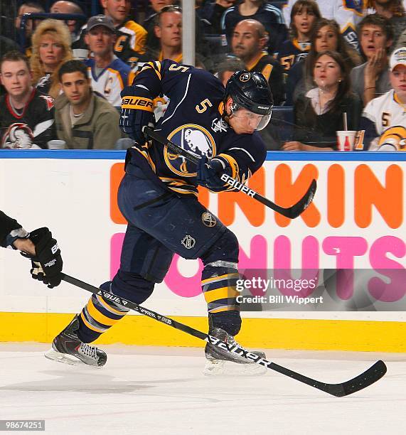 Toni Lydman of the Buffalo Sabres shoots the puck against the Boston Bruins in Game Five of the Eastern Conference Quarterfinals during the 2010 NHL...